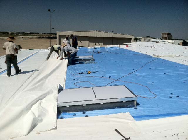 PVC Roof being Installed - Polyvinyl Chlorid - Nelson Roofing Company