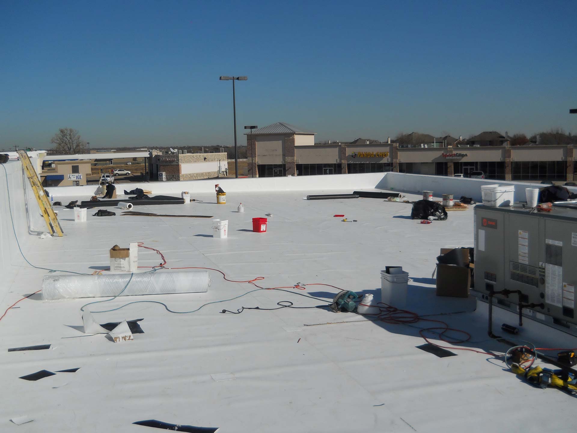 TPO Roof being Installed - Thermoplastic Polyolefin - Nelson Roofing Company