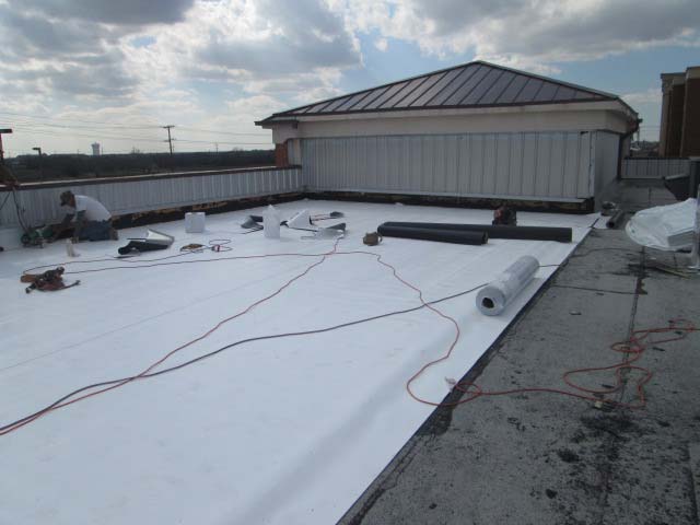 TPO Roof being Installed - Thermoplastic Polyolefin - Nelson Roofing Company