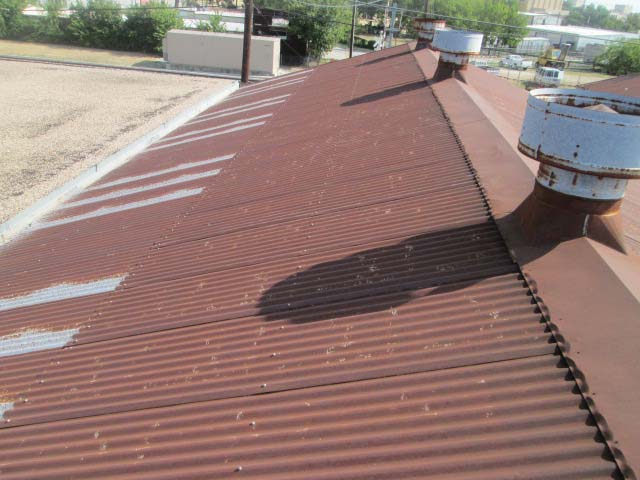 Before Roof Coating - Nelson Roofing Company