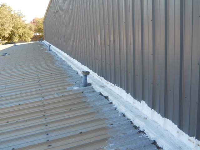 Metal Roof before TPO - Thermoplastic Polyolefin - Nelson Roofing Company