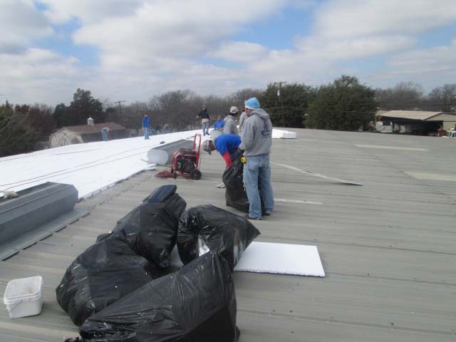 Metal Roof Overlay with TPO being Installed - Thermoplastic Polyolefin - Nelson Roofing Company