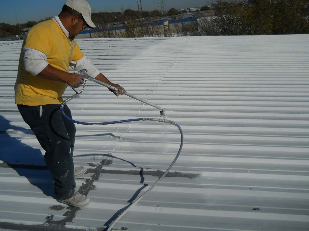 Roof Coating being Installed - Nelson Roofing Company