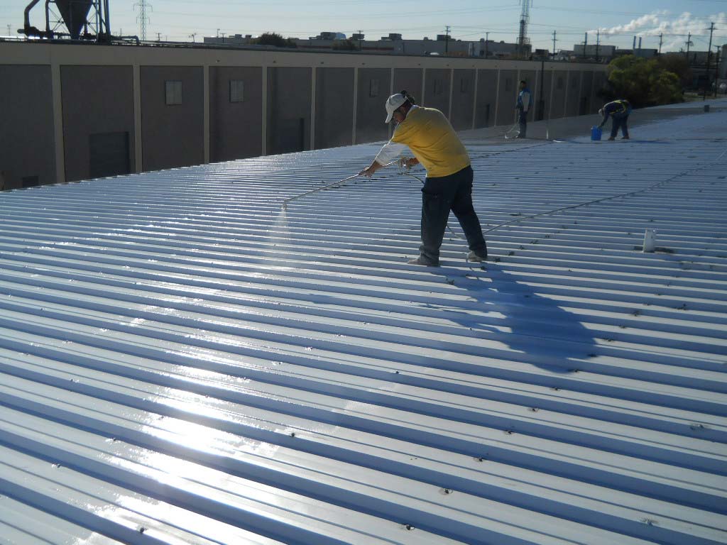 Roof Coating being Installed - Nelson Roofing Company