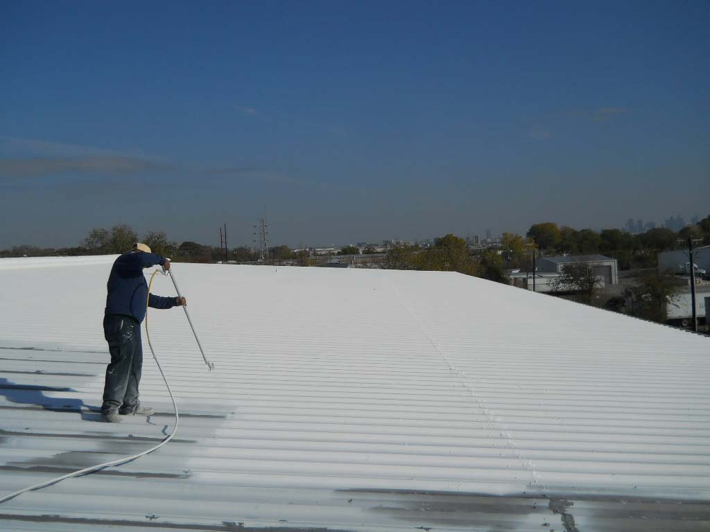 Roof Coating being Installed - Nelson Roofing Company