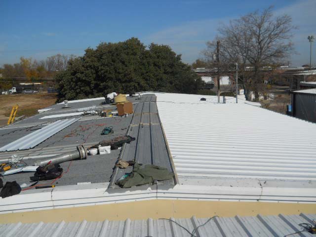 White Metal Roof being Installed - Nelson Roofing Company