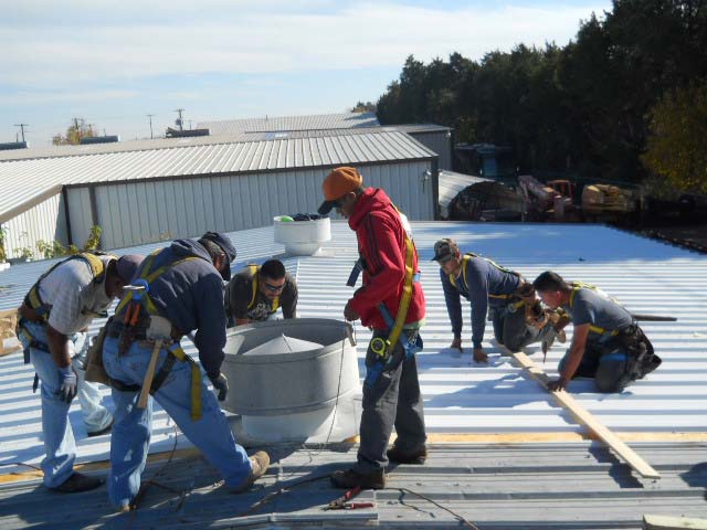 White Metal Roof being Installed - Nelson Roofing Company