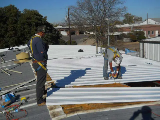 White Metal Roof being Installed - Nelson Roofing Company